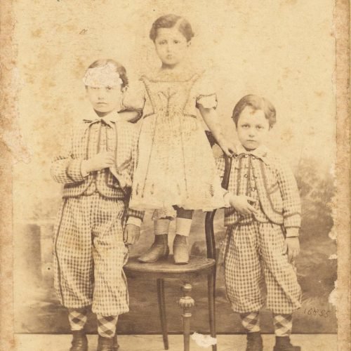 Photograph of three young boys in the photographer's studio. John, Constantine and Paul Cavafy are depicted. C. P. Cavafy in 