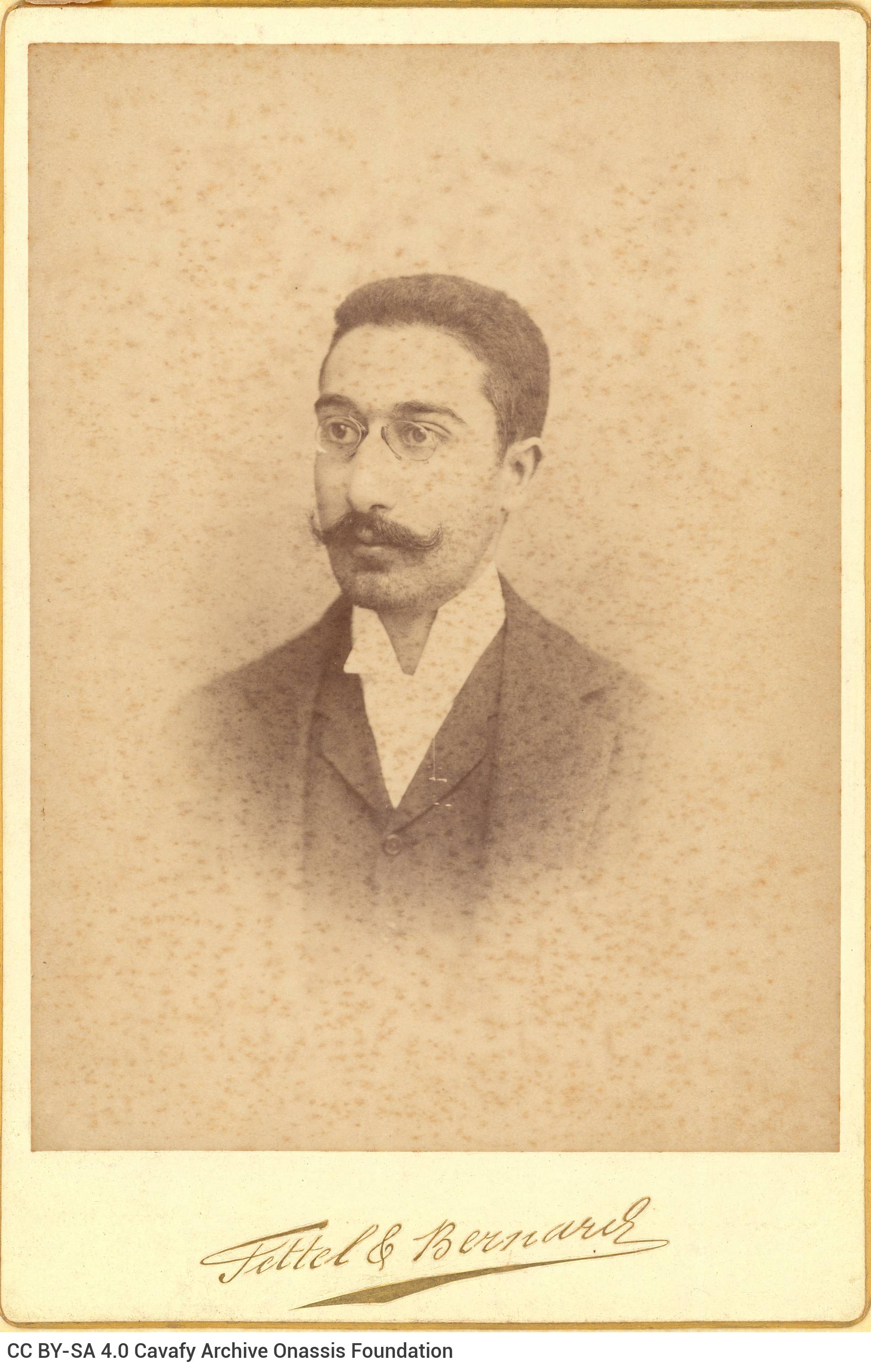 Undated photographic portrait of Cavafy by the photo shop of Fettel & Bernard in Alexandria, in two copies. The poet has shor