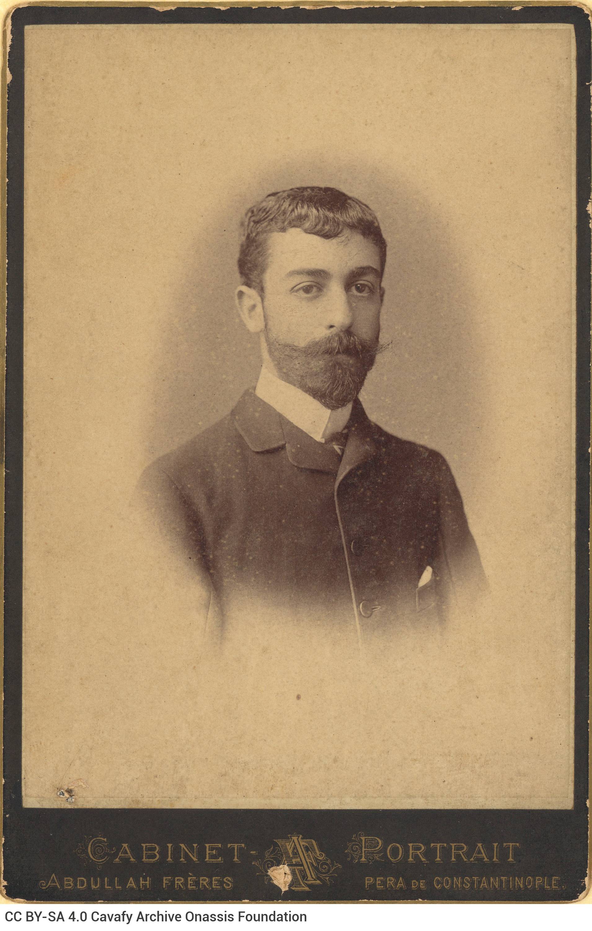 Photograph of Paul Cavafy at a young age in Istanbul (1882-1885), with a moustache and beard. The logo of the photo shop in t