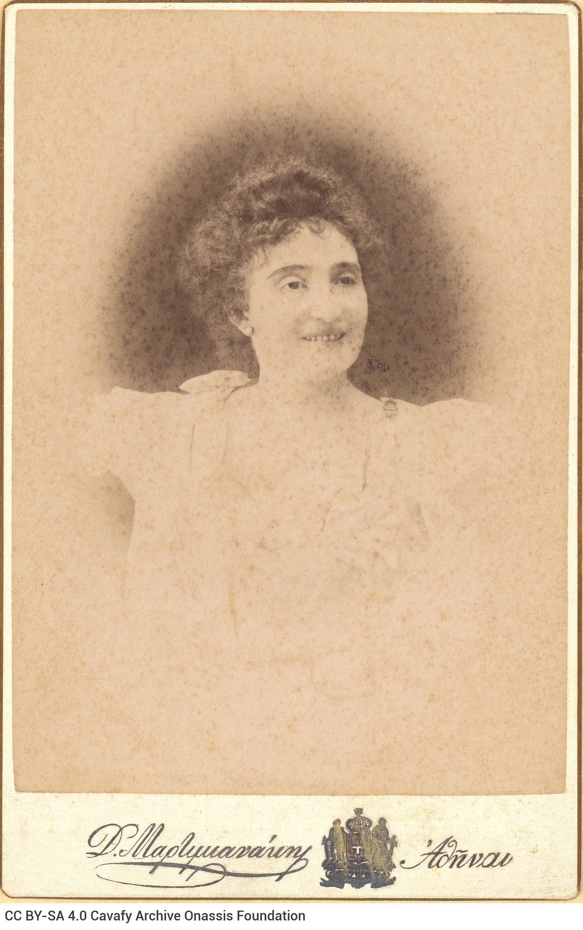 Photographic portrait of the poet's aunt, Amalia Callinus, née Fotiadi. The logo of the photo shop in the lower part of the 